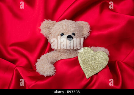 Valentines Day Concept Red Teddy Bear In Heart Shaped Gift Box