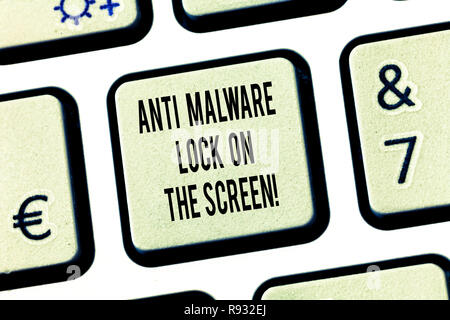 Conceptual hand writing showing Anti Malware Lock On The Screen. Business photo text Security safety against malware hacking Keyboard key Intention to Stock Photo