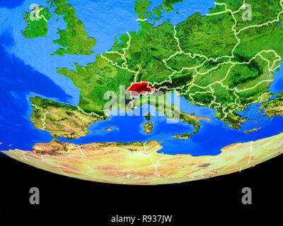 Switzerland on model of planet Earth with network during sunrise ...