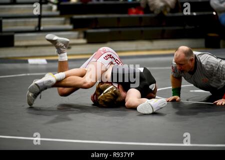 High school wrestler getting pinned by his opponent Stock Photo - Alamy