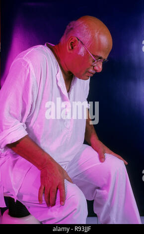 Indian old man suffering from lower back pain Stock Photo - Alamy