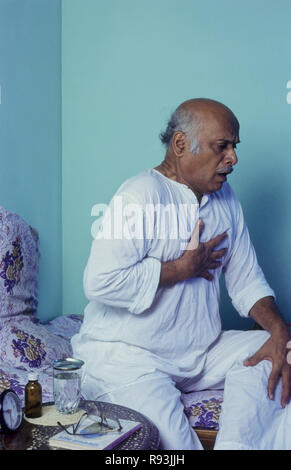 Indian old man having chest pain MR#556 Stock Photo