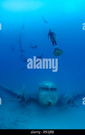 Freedivers at plane wreck Douglas Dakota, Mediterranean Sea, Kaş, Kas, Turkey Stock Photo