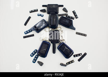 Close-up damaged car key isolated on white background. Stock Photo