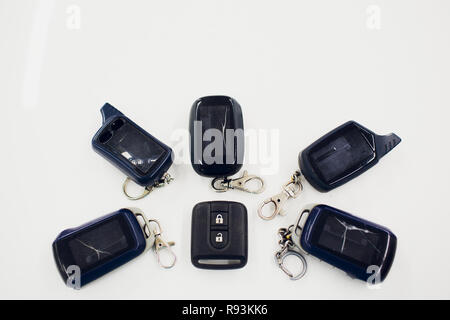 Close-up damaged car key isolated on white background. Stock Photo
