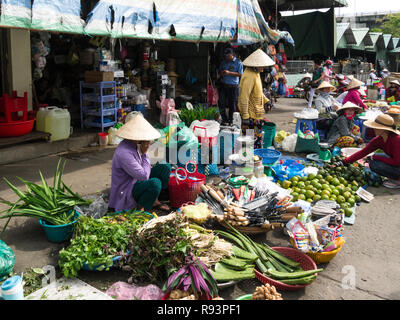 Fresh Fruit and vegetables laid out on the ground displayed for sale Can Tho  City outdoor market Vietnam Asia Stock Photo