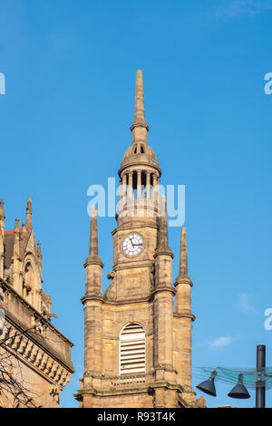 Glasgow, Scotland, UK - December 14, 2018: Looking up to the Clock Tower from the Old St Georges Tron Parish Church in Nelson Mandela Place Glasgow. Stock Photo