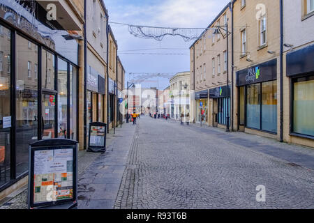 Kilmarnock, Scotland, UK - December 10, 2018: Burns Precinct pedestrian area in the Scottish town centre of Kilmarnock with empty shops being an area  Stock Photo