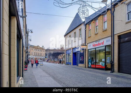 Kilmarnock, Scotland, UK - December 10, 2018: A pedestrian area in the Scottish town centre of Kilmarnock with empty shops being an area of high unemp Stock Photo