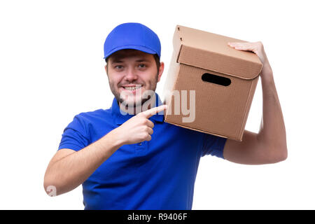 Picture of man in blue t-shirt and baseball cap with cardboard box Stock Photo
