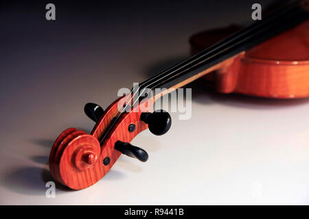 1937 old violin on the dim background Stock Photo