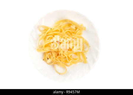 A photo of a plate of Italian pasta with Parmesan cheese, shot from the top, isolated on a white background with a clipping path Stock Photo