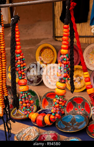 Morocco, Ouarzazate, Ksar of Ait-Ben-Haddou, Kasbah, souvenir stall, traditional Berber tribal style necklace in sale