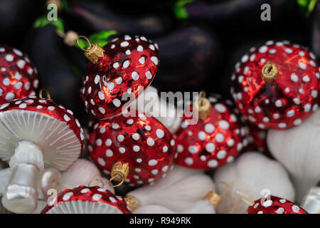 Ornamental red Toadstools with white spots on display. Stock Photo