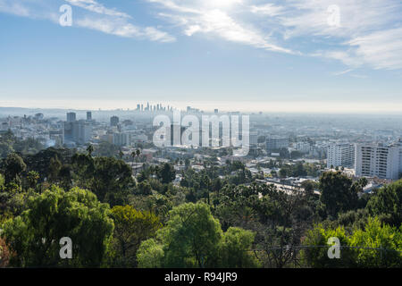 Los Angeles, California, USA - December 16, 2018:  Clear morning cityscape view towards Hollywood and downtown LA from hiking trail at Runyon Canyon P Stock Photo