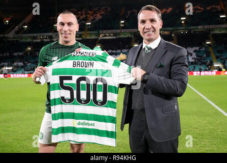 Celtic's Scott Brown is presented with a shirt from manager Brendan Rodgers for his 500th appearance for the club before the Ladbrokes Scottish Premiership match at Celtic Park, Glasgow. Stock Photo