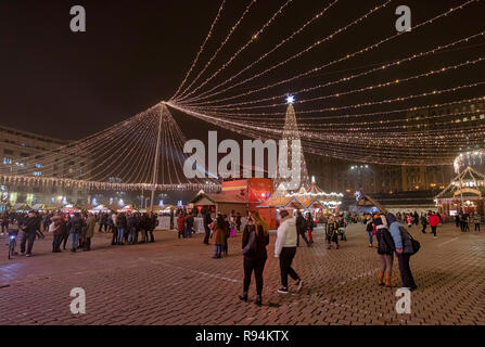 BUCHAREST, ROMANIA - DECEMBER 7: The Christmas Market is seen on December 7, 2018 in Bucharest, Romania. The main Christmas Market is organised from year to year in front of the Romanian Parliament at the Piata Constitutiei (Constitutiei Square). Stock Photo