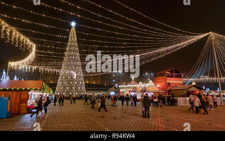 BUCHAREST, ROMANIA - DECEMBER 7: The Christmas Market is seen on December 7, 2018 in Bucharest, Romania. The main Christmas Market is organised from year to year in front of the Romanian Parliament at the Piata Constitutiei (Constitutiei Square). Stock Photo