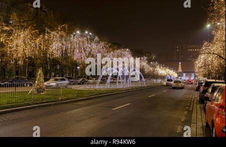 BUCHAREST, ROMANIA - DECEMBER 7: Christmas lights are seen at Bulevardul Unirii (Unirii Boulevard) on December 7, 2018 in Bucharest, Romania. Unirii is the best-known boulevard of the Romanian capital. Stock Photo