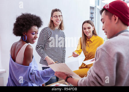 Creative fashion designers feeling good working together Stock Photo