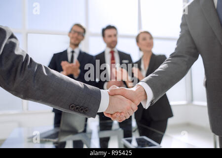 business handshake over blurry background office Stock Photo