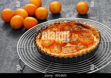 Kumquat, its raw rind is sweet, with the flesh is sour like the lemon. Stock Photo