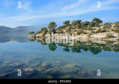 Esparron Lake and Lakeside Reflected in the Lake and its Shallows, Esparron-de-Verdon, Alpes-de-Haute-Provence, Provence, France Stock Photo