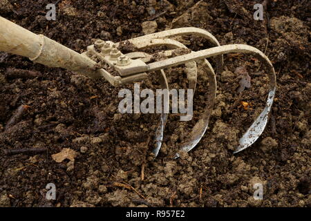 A manual soil cultivator Stock Photo