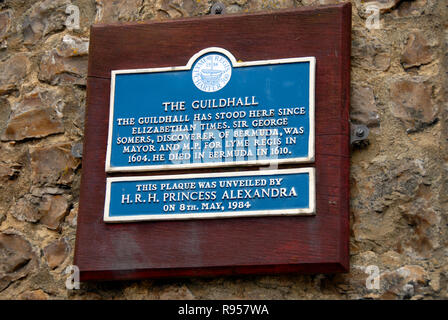 Plaque on side of guildhall, Lyme Regis, Dorset, England Stock Photo
