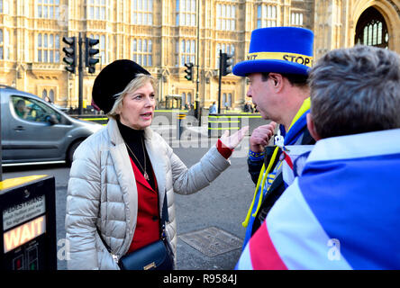 Anna Soubry MP (Con: Broxtowe) talking to anti-Brexit campaigner Steve Bray of SODEM across the road from Parliament, 19th Dec 2018 Stock Photo