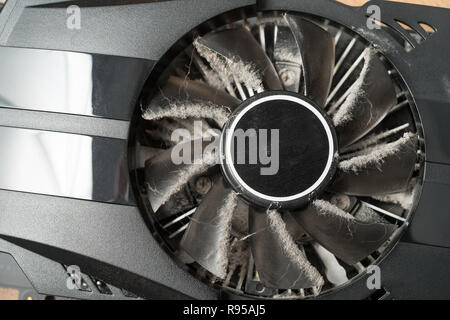 Closeup of dusty computer graphics card fan. Stock Photo