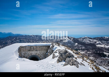 Covered in deep snow tunnel leading to Njegos mausoleum at the top of Mount Lovcen in Lovcen National Park, Montenegro Stock Photo