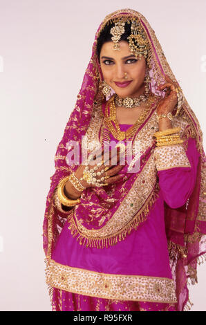 Muslim Indian bride wedding dress white background India - MR#144 Stock  Photo - Alamy