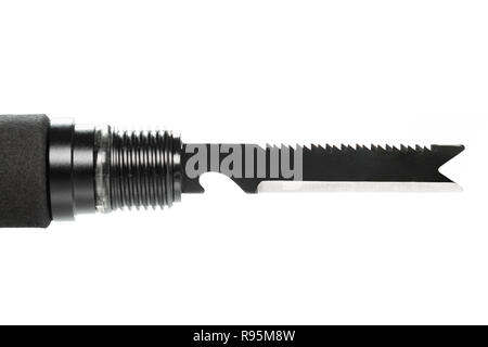 Multifunctional knife with a saw and bottle opener. Object is isolated on white background. Stock Photo