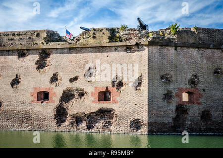 Bullet holes / cannon holes in the brick walls of Fort Pulaski National Monument in Georgia from the Civil War Stock Photo