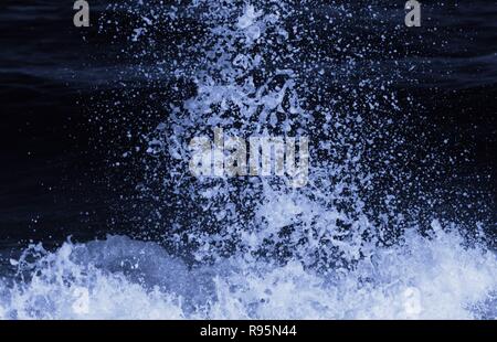 Breaking wave abstracted in post-processing. Stock Photo