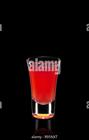 Fresh cranberry juice as ingredient for vodka cocktail isolated on black Stock Photo