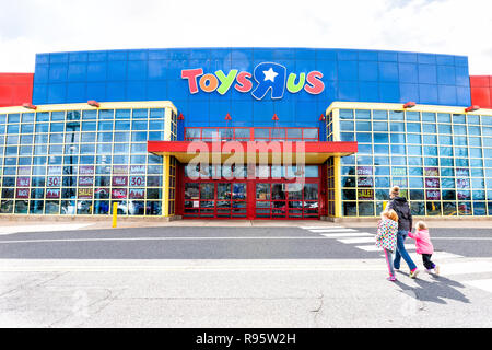 Fairfax, USA - April 5, 2018: Toys R US store shop, Virginia, entrance, promotion, advertising signs, logo, doors, closing going out of business bankr Stock Photo