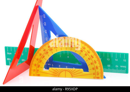 School drawing tools. Triangle, ruler, protractor on white background Stock Photo
