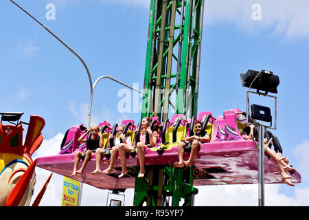 THRILL SEEKERS ON SHOW RIDE Stock Photo