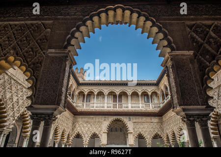 Architecture of the famous Alcazar of Seville in Granada, Andulasia, Spain. The palace is a famous Islamic historical palace with spectacular architec Stock Photo