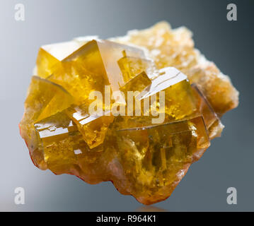 Macro mineral stone Fluorite crystal on a black background close-up Stock Photo