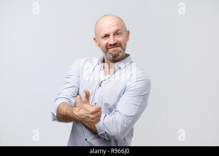 Young european man with thumb up. Positive mood Stock Photo
