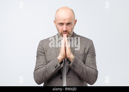 Please help me now. Bearded mature man need a help. Stock Photo