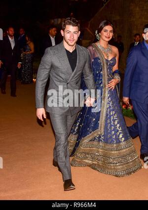 Indian actress Priyanka Chopra with her husband US musician Nick Jonas are seen during their wedding reception at the hotel JW Marriott in Mumbai. Stock Photo