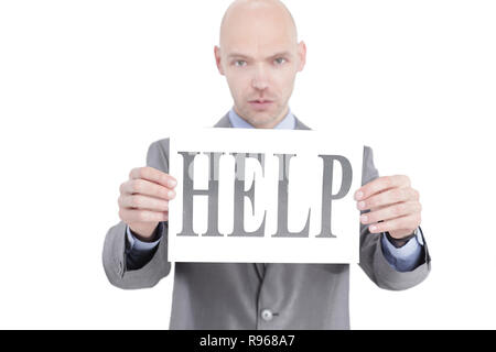 confident businessman holding a banner with the word HELP Stock Photo