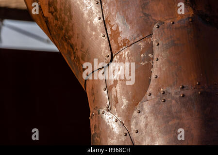Rusted steel plates joined with rivets Stock Photo