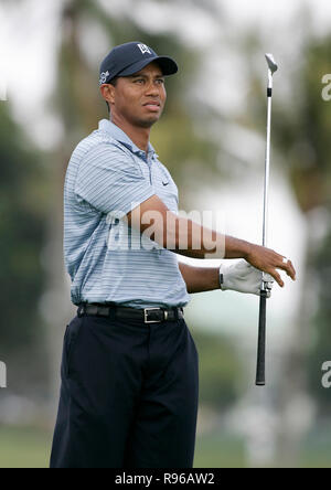 Tiger Woods watches his tee shot on the 10th hole during the second ...