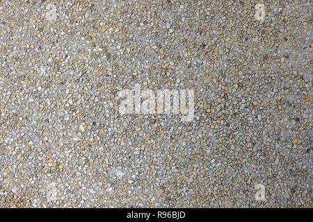 Close up colorful pebbles concrete background Stock Photo