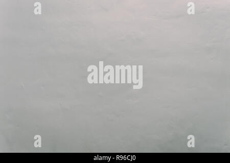 concrete wall background. Natural color plaster on a concrete wall. Plaster, plaster texture, plaster background. Natural plaster wall. Natural stucco Stock Photo
